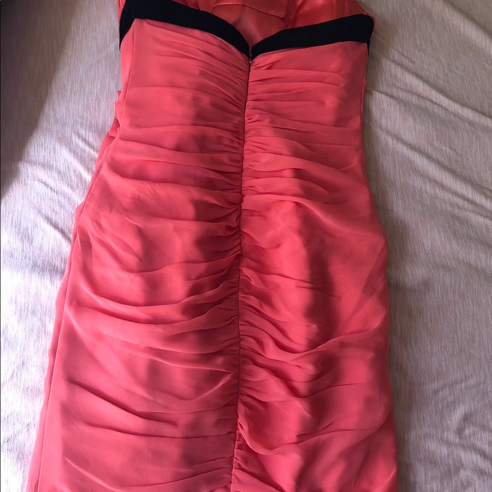 Short tangerine colored formal dress